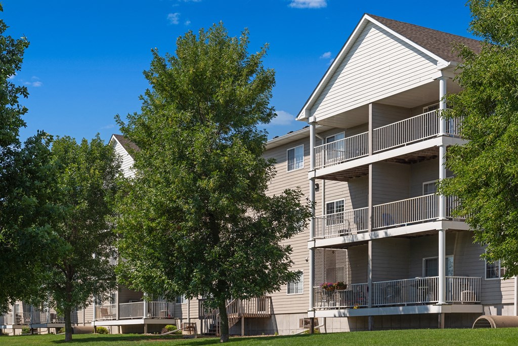 our apartments feature a spacious yard with trees and balconies