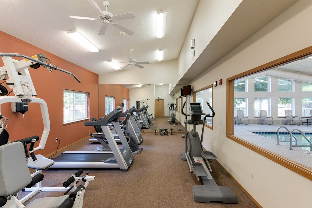 the gym with treadmills and other exercise equipment