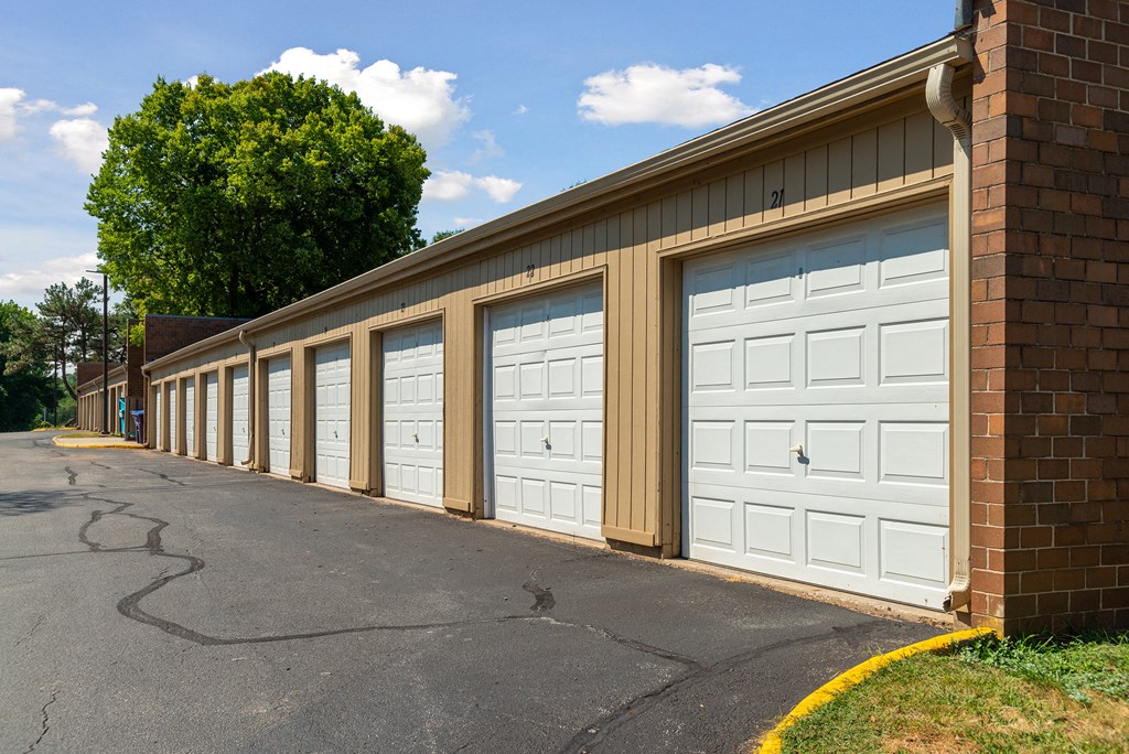 a row of garages on the side of a building
