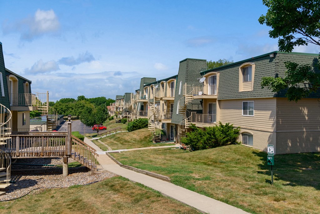 a row of houses on the side of a street