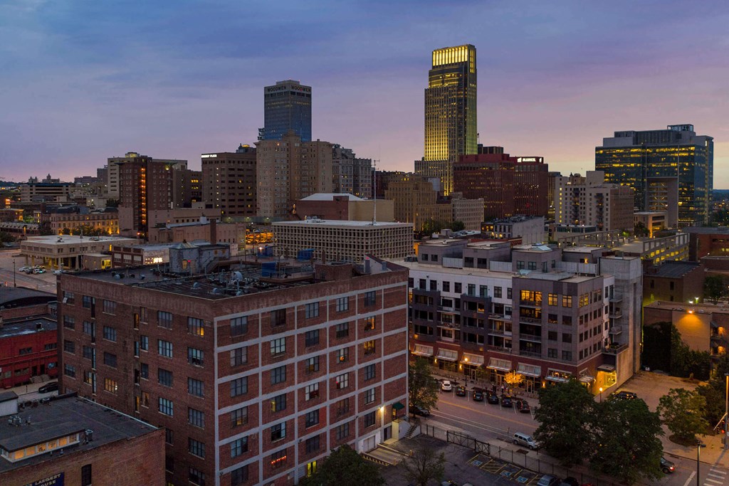 a view of the skyline at dusk in the city