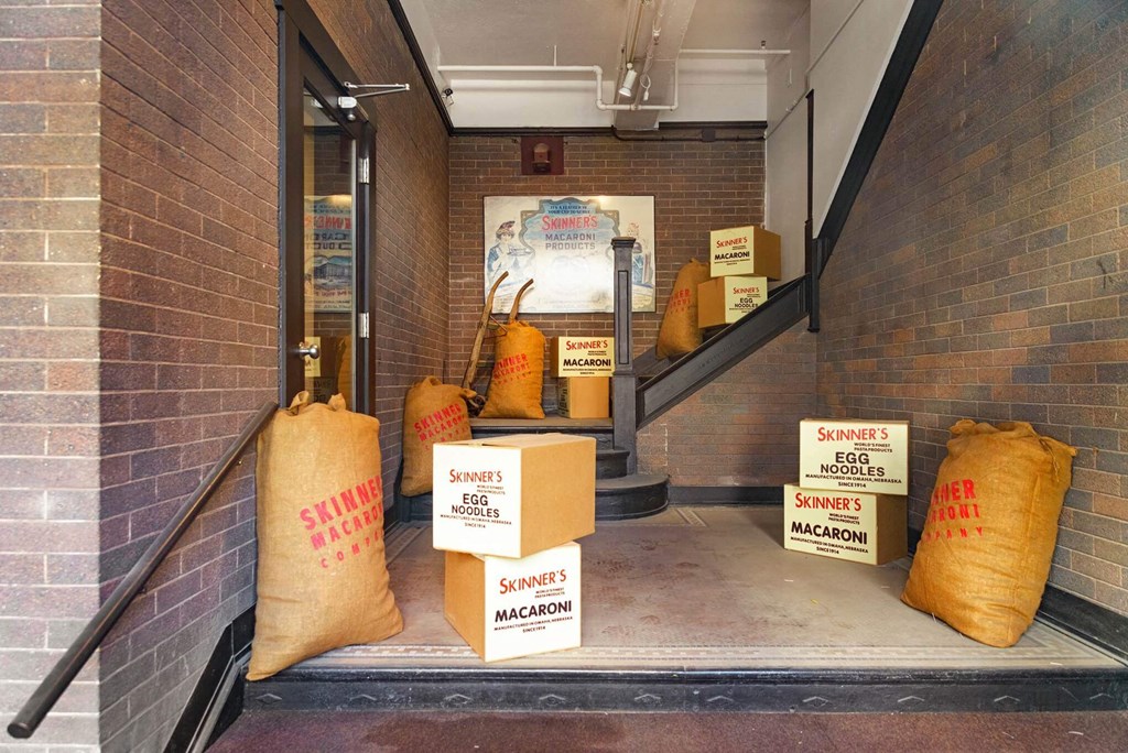 a display of bags and boxes outside of a building