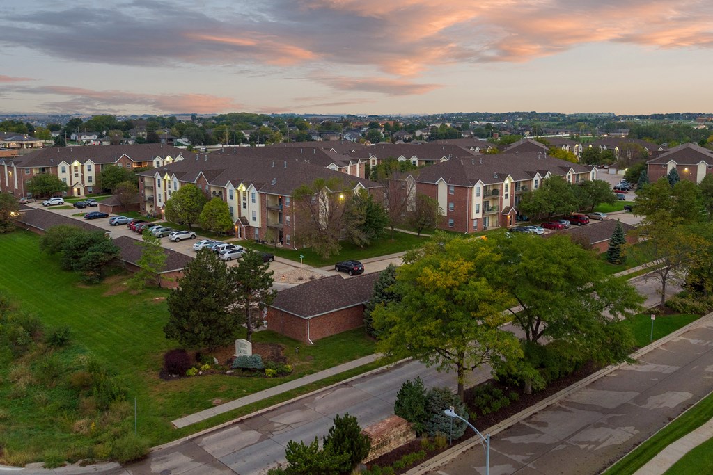 an aerial view of a neighborhood with houses and trees