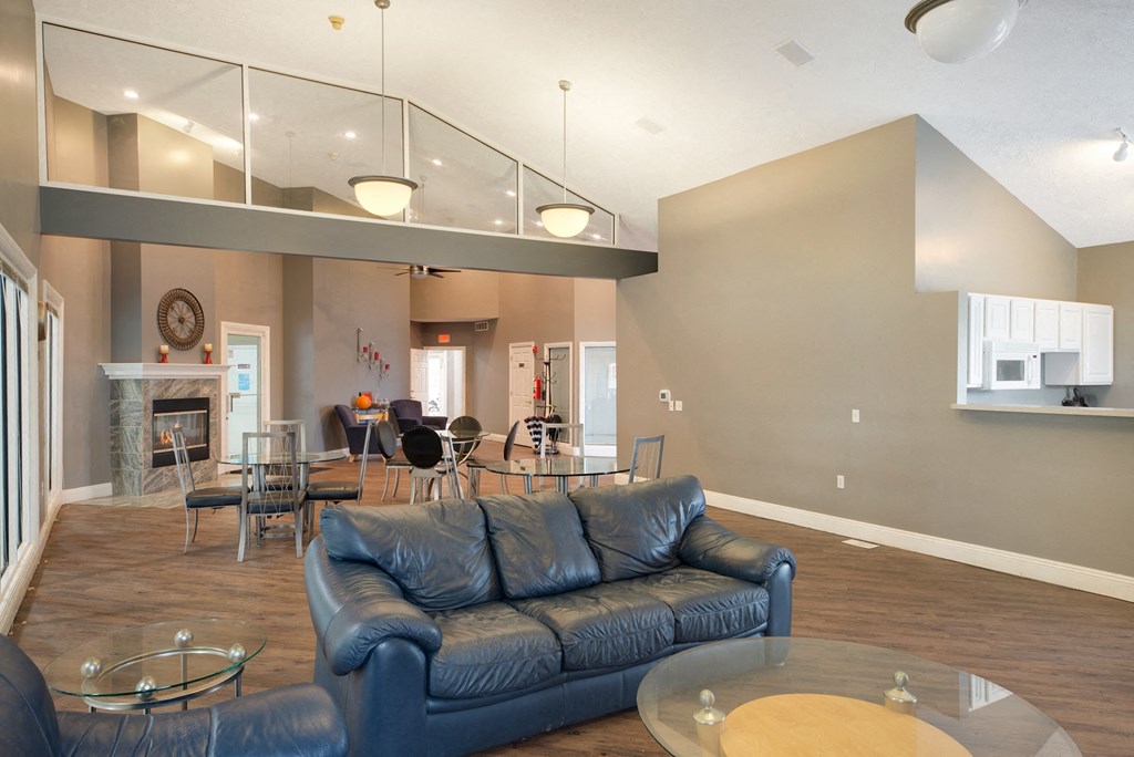 the living room of a house with a couch and a table