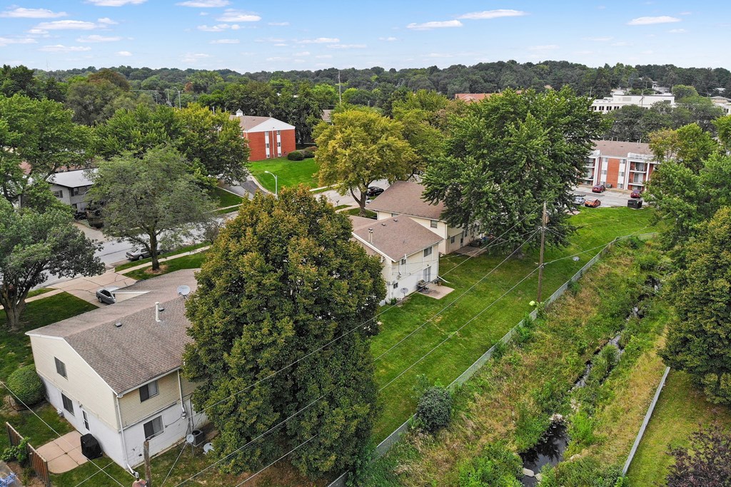 a aerial view of a neighborhood with houses and trees