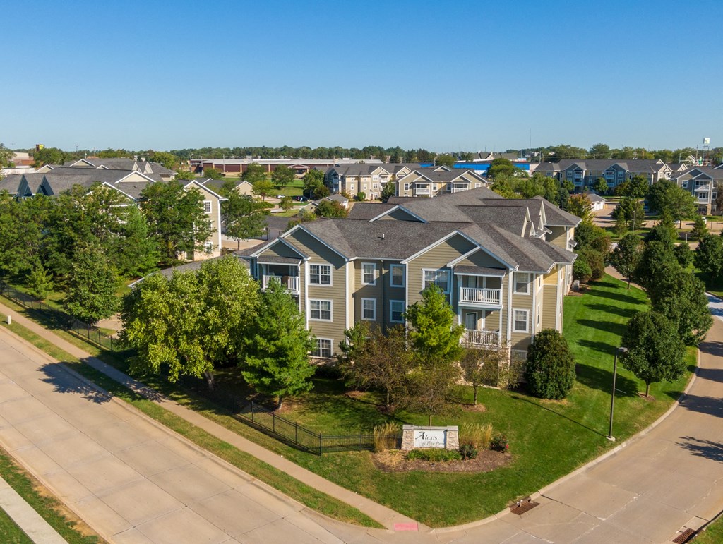 an aerial view of multiple houses in a neighborhood