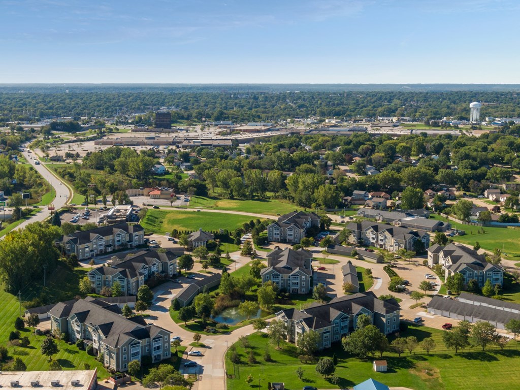an aerial view of a suburb of a city with houses