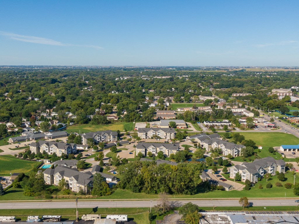 an aerial view of a neighborhood of houses in a suburb