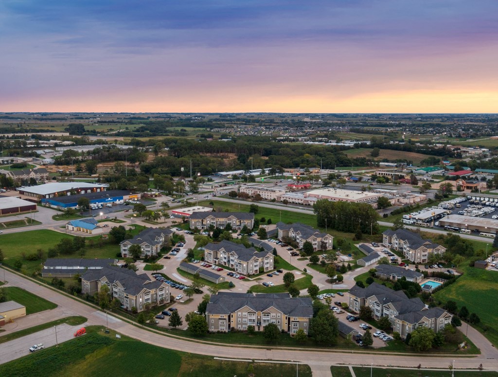 an aerial view of a suburb of a city with houses