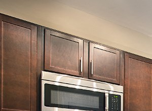 a kitchen with stainless steel appliances and a counter top