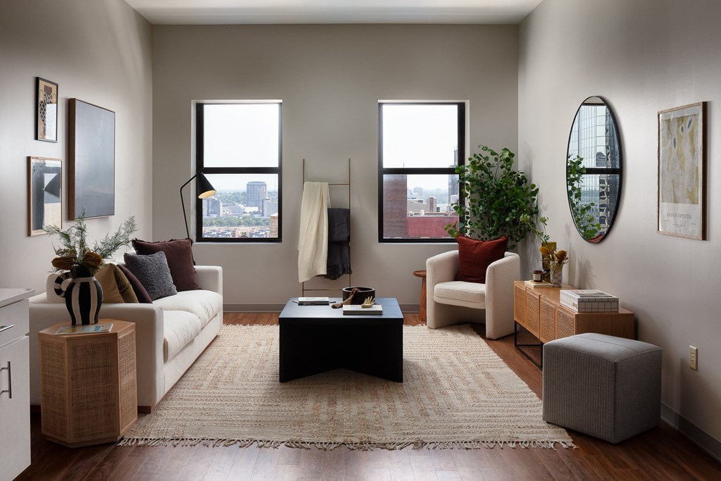 a living room with a white couch and a coffee table