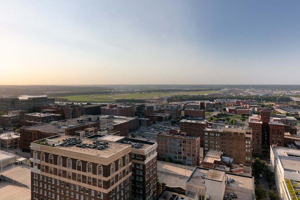 an aerial view of the city at sunset