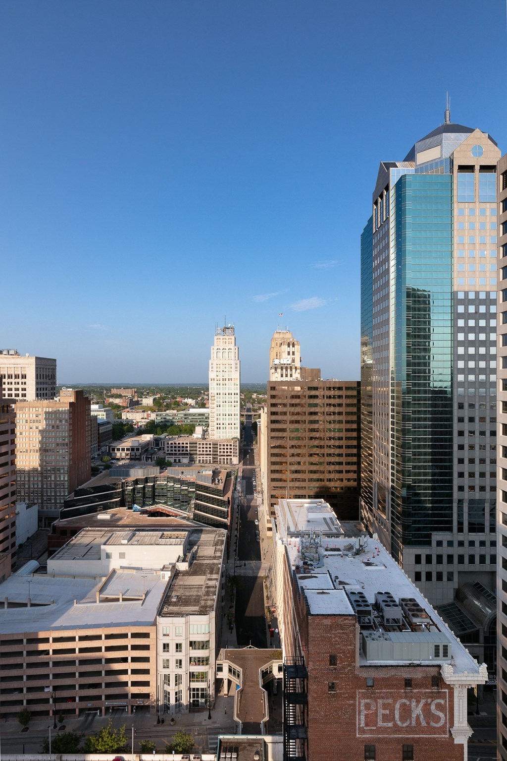 a view of the city skyline from the roof of a building
