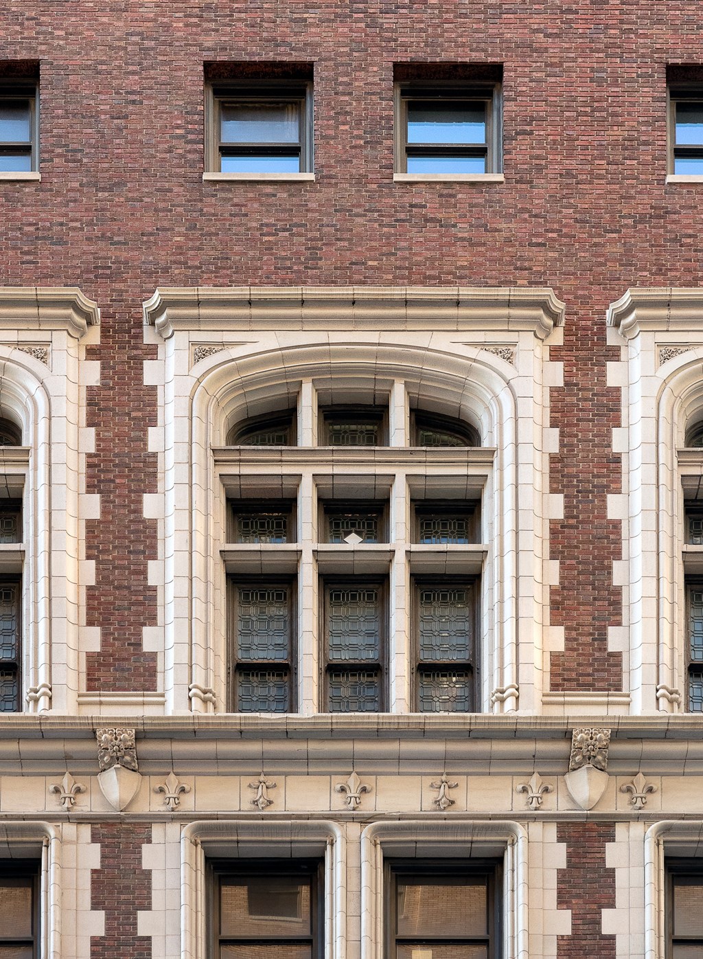 the facade of a brick building with windows