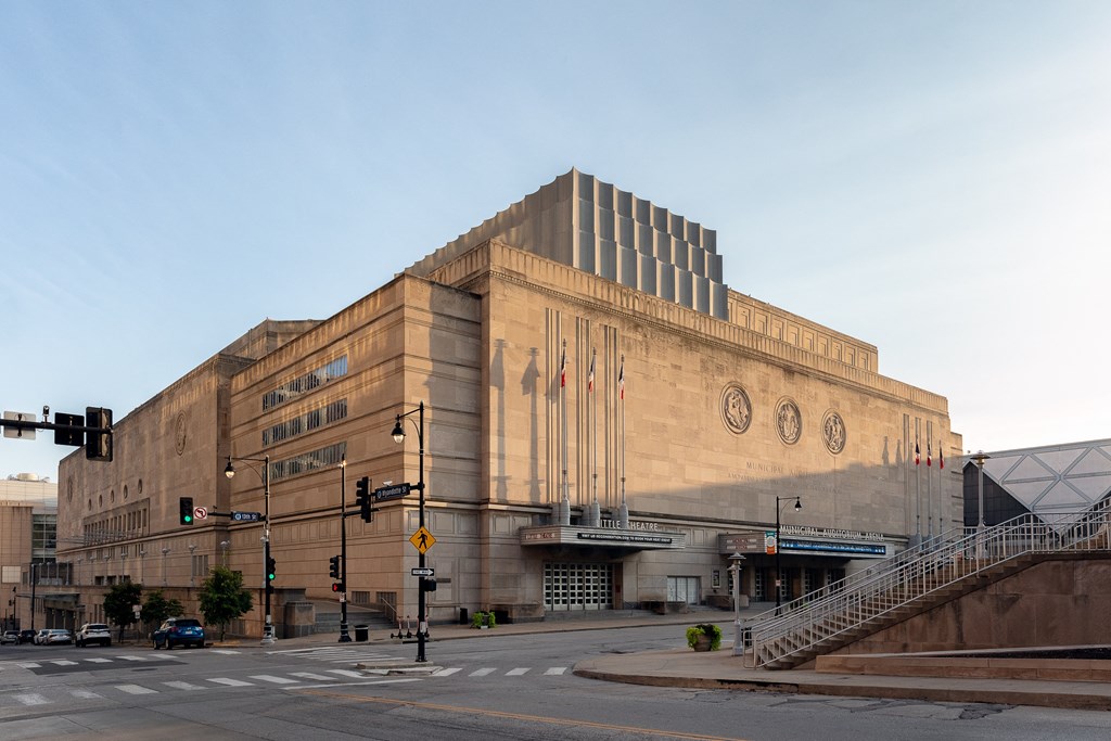 a large building with a street in front of it