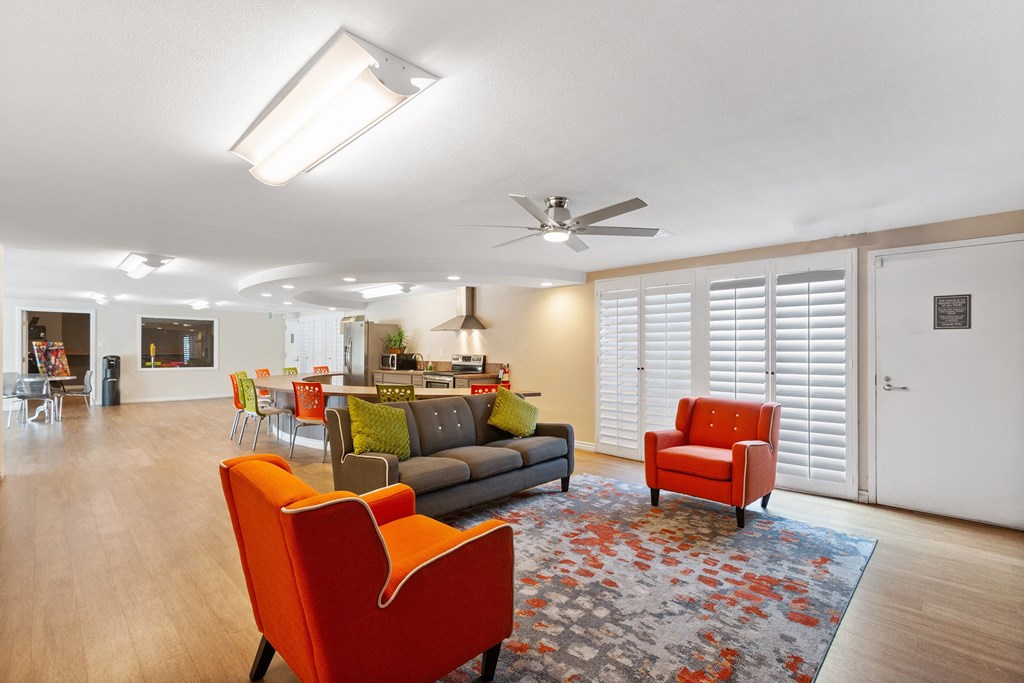 a conference room with chairs and a table and windows at Terramonte Apartment Homes, California, 91767