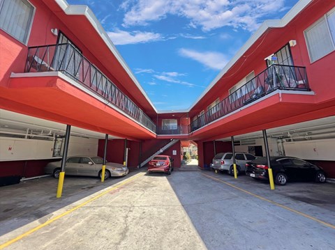 A parking lot with cars parked in it.