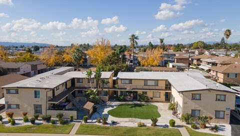 A residential area with houses and trees.