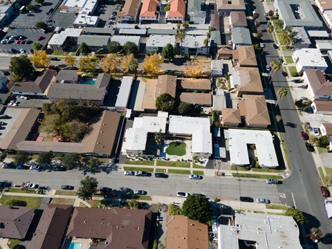 A residential area with houses and trees.