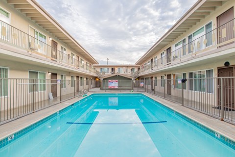 A large indoor swimming pool in a residential building.