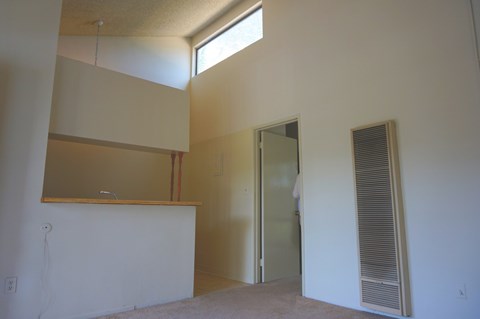 A room with a door and a window.