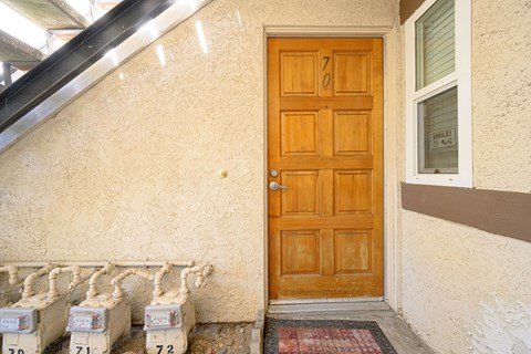 the front door of the house at Oak Terrace Senior Apts, Hemet, 92543