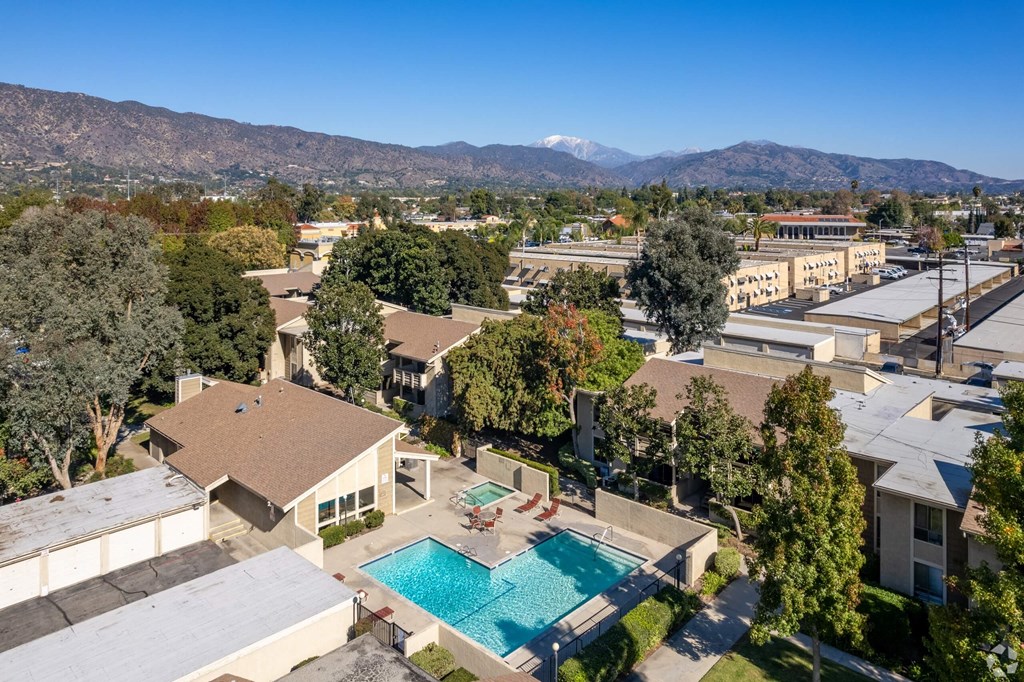 a aerial view of a pool and buildings in a city at Alosta Place, California, 91702