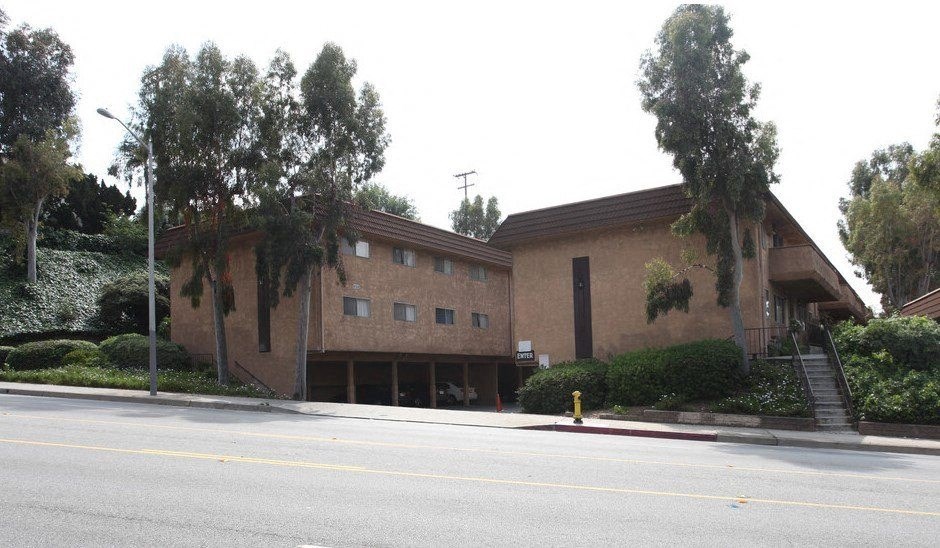 a brown building on the side of a street at North View Terrace, California, 90640