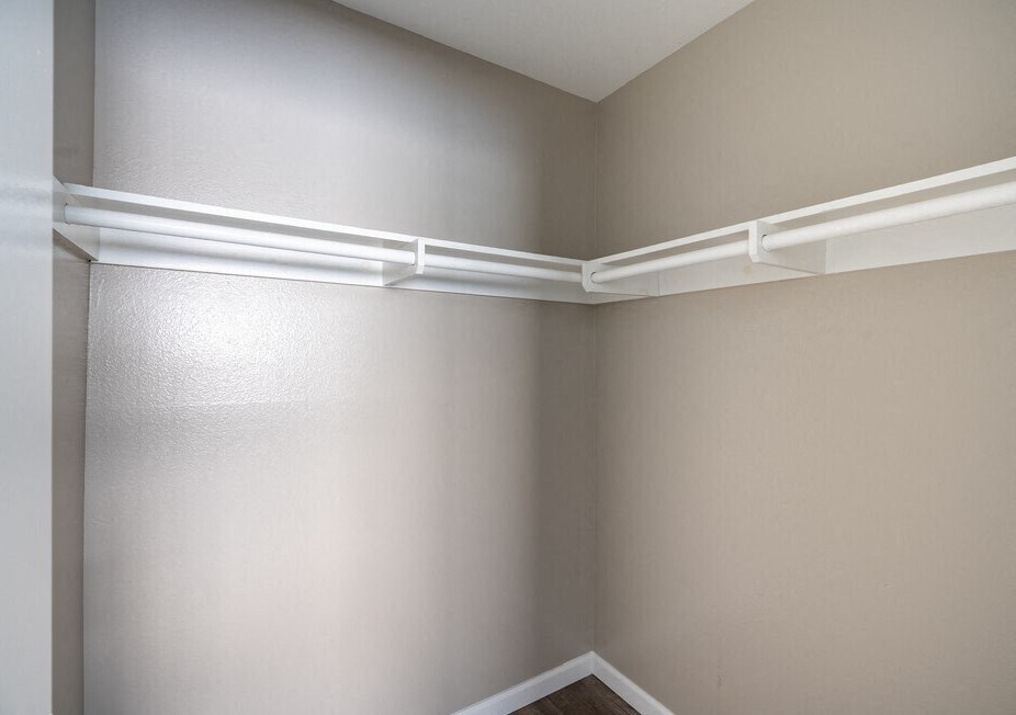 the corner of a room with white shelves on the wall at North View Terrace, Montebello, 90640