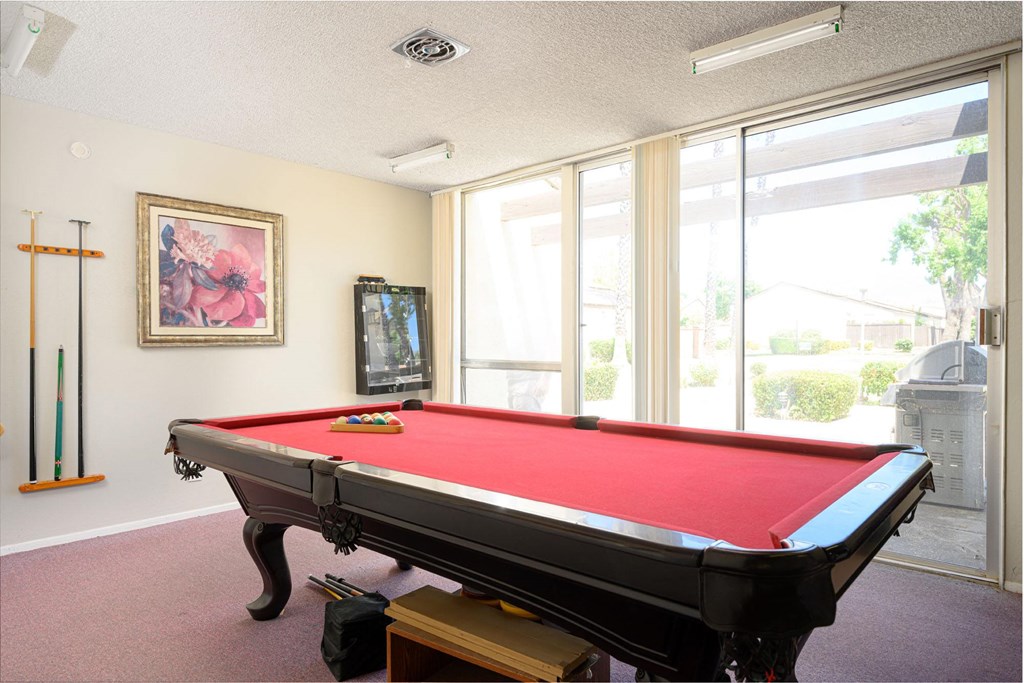a games room with a pool table and a television at Villa Hemet, Hemet, 92543