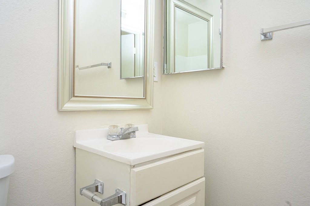 a bathroom with a sink and a mirror  at Villa Hemet, Hemet, CA 92543