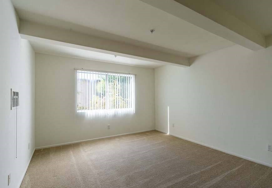 a large empty room with a large window at Mountainview Venture, Covina