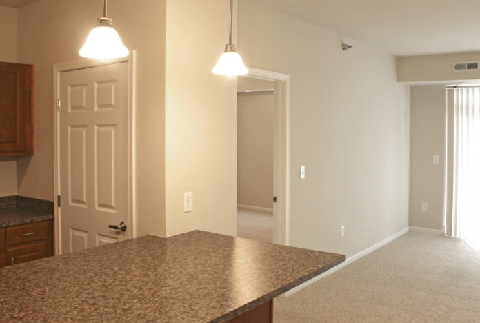 a view of the kitchen and living room