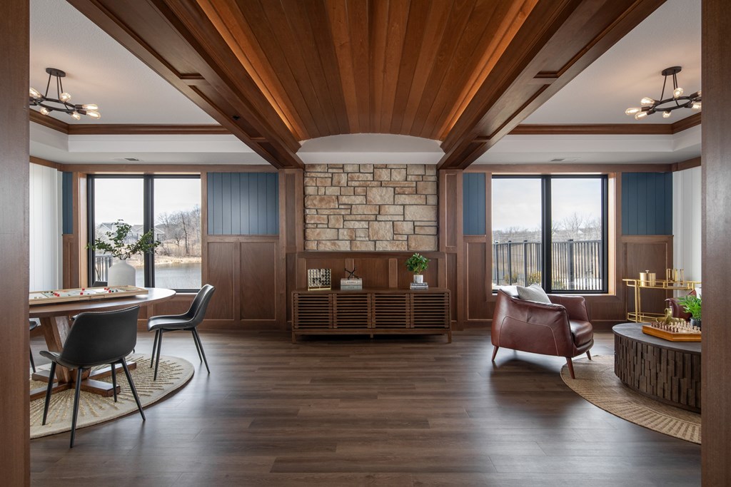 A living room with wooden floors and furniture.