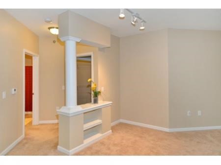 a living room with a white column