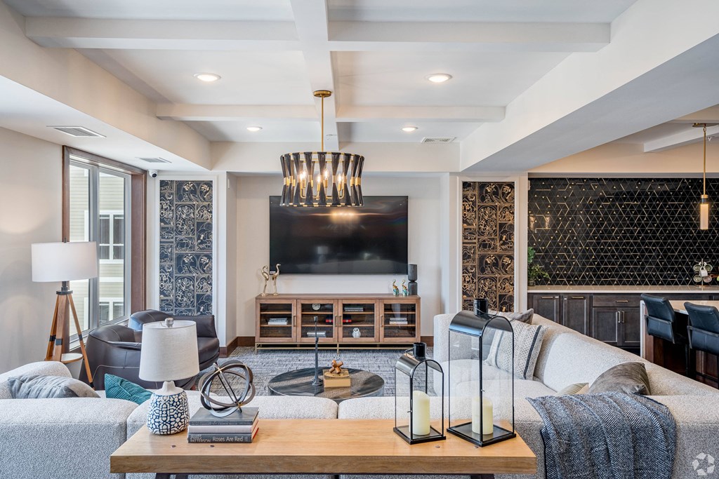 a living room with a couch and a tv
