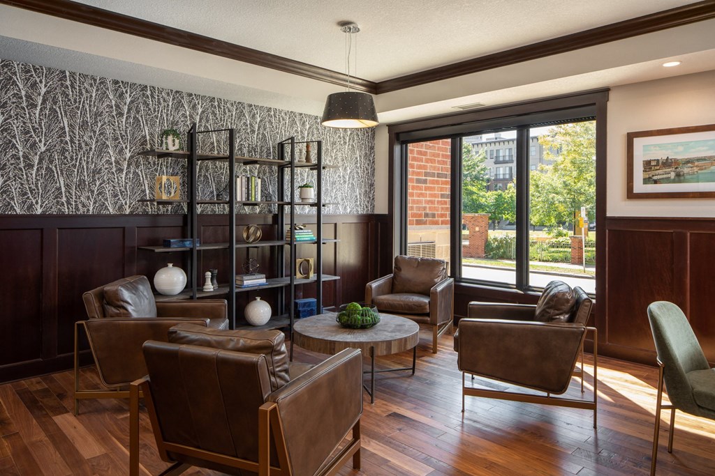 Cafe lounge area with table and chairs  at The Whitley, St. Paul, 55101