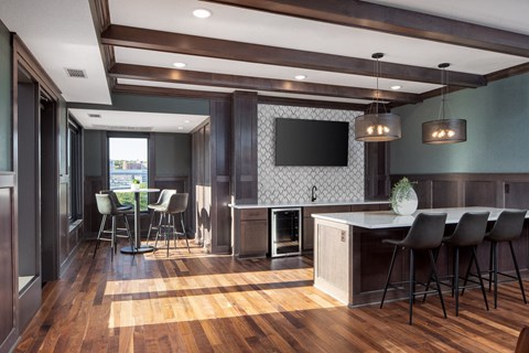 a large kitchen and dining room with a table and chairs