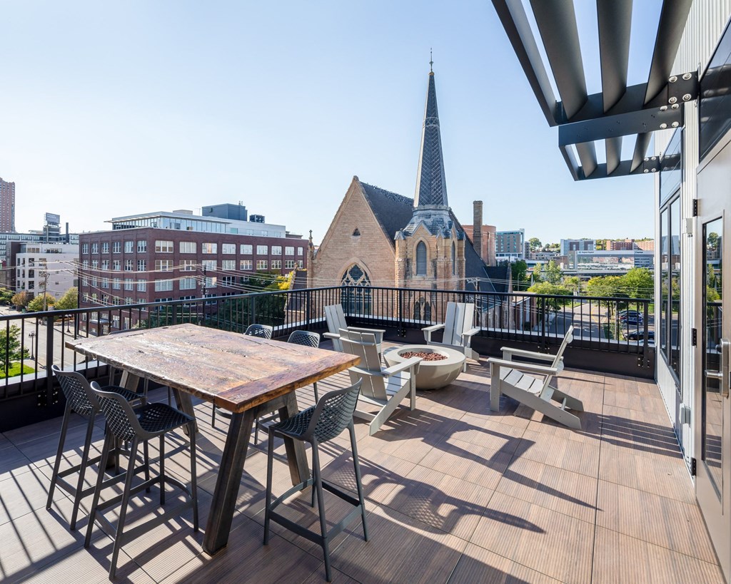 Rooftop deck with lounge seating and gas firepit  at The Whitley, St. Paul, 55101