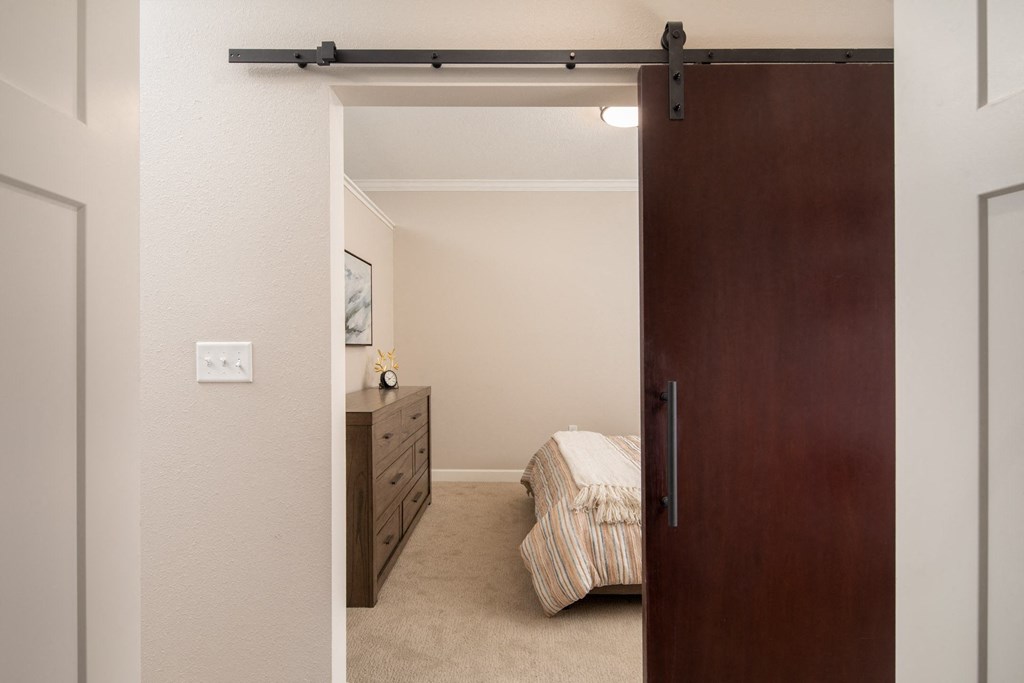 View of bedroom with modern sliding sliding door  at The Whitley, Minnesota