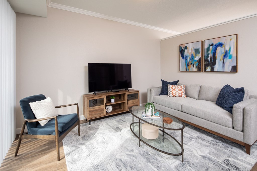 View of cozy model living room  at The Whitley, St. Paul, MN