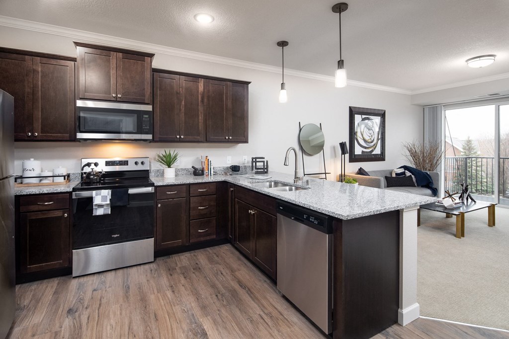 granite countertops in spacious kitchen at The Gallery Apartments, Burnsville, MN, 55337