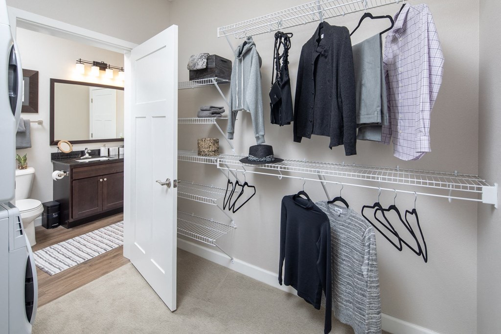 a walk in closet connected to a bathroom at The Gallery Apartments, Burnsville