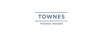 A logo with the words "Towne at Thomas Woods" in blue.