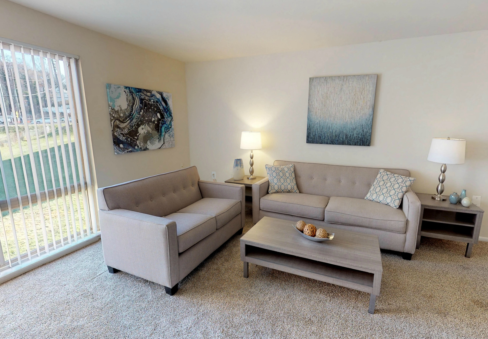 A living room with two couches and a coffee table.