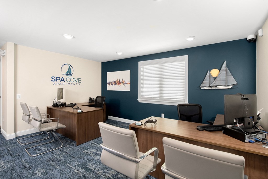A Spa Cove Apartments office with two desks and chairs. at Spa Cove Apartments, Annapolis, 21403