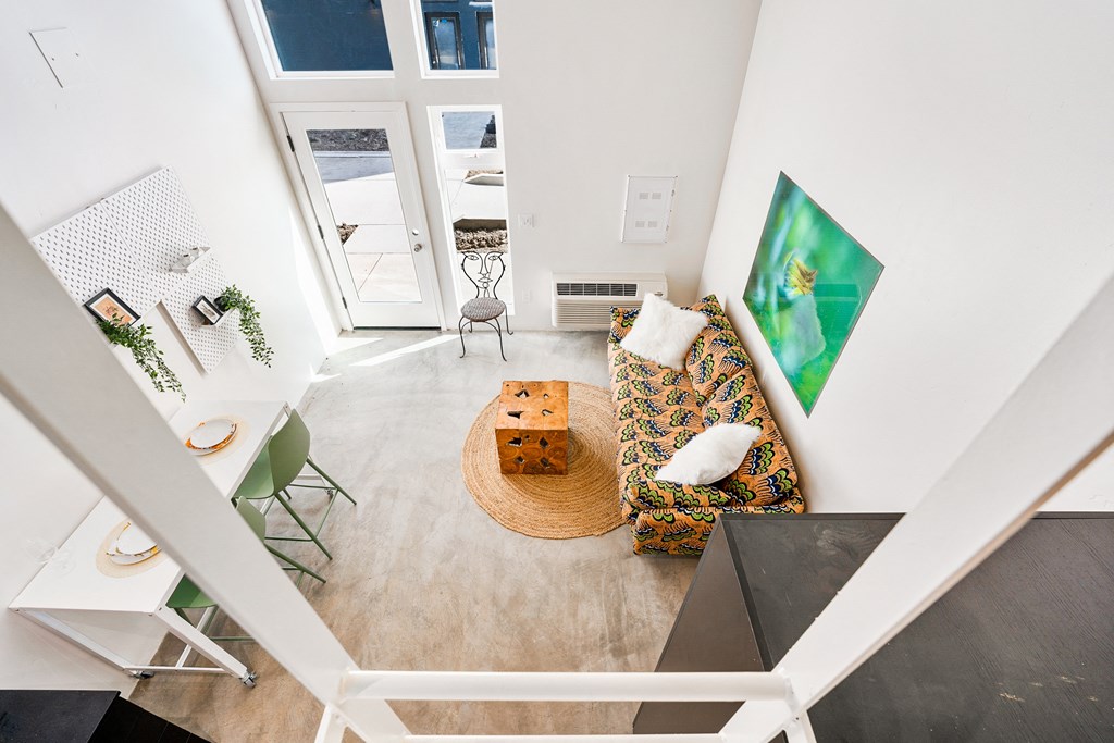 a living room with a couch and a table