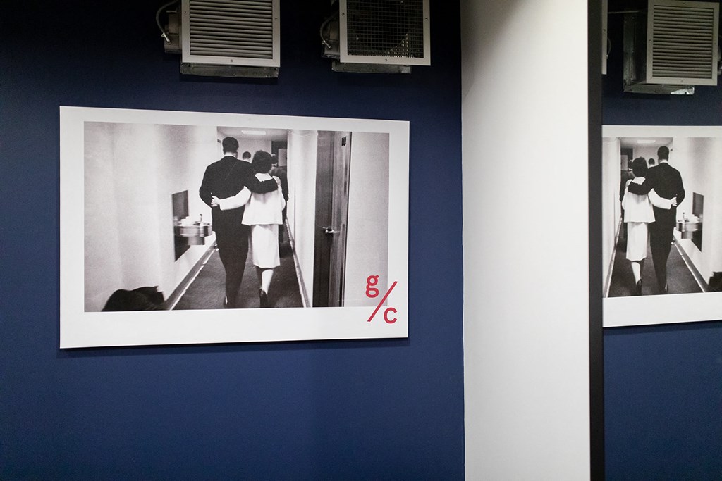 a photo of a man and a woman standing in front of a door and a picture of