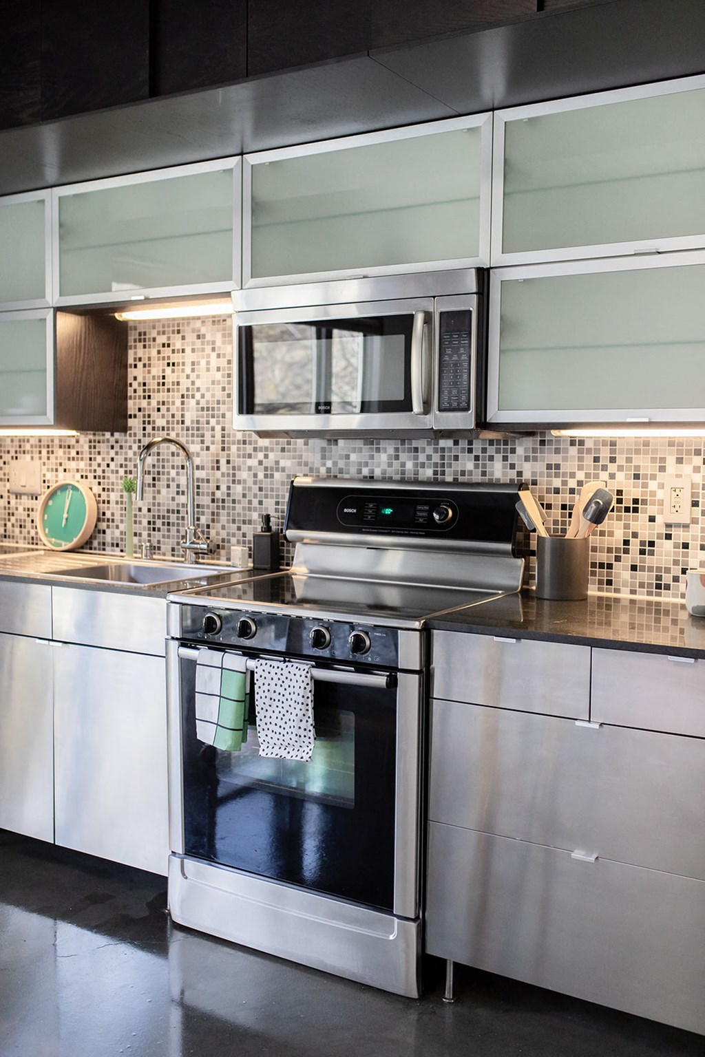 a kitchen with stainless steel appliances