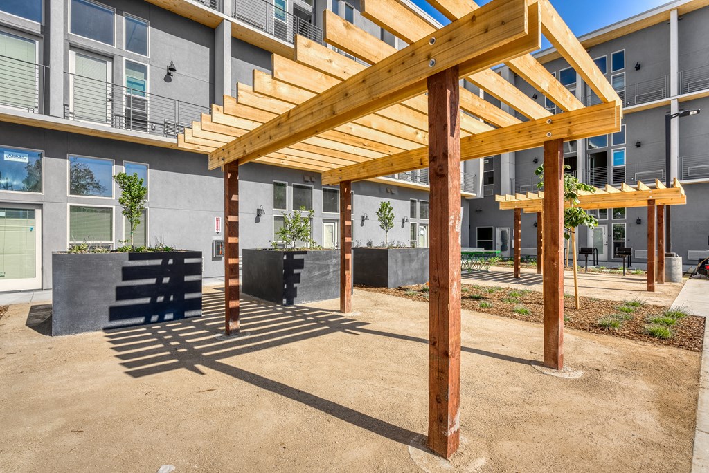 a view of the pergola and outdoor seating area at the bradley braddock